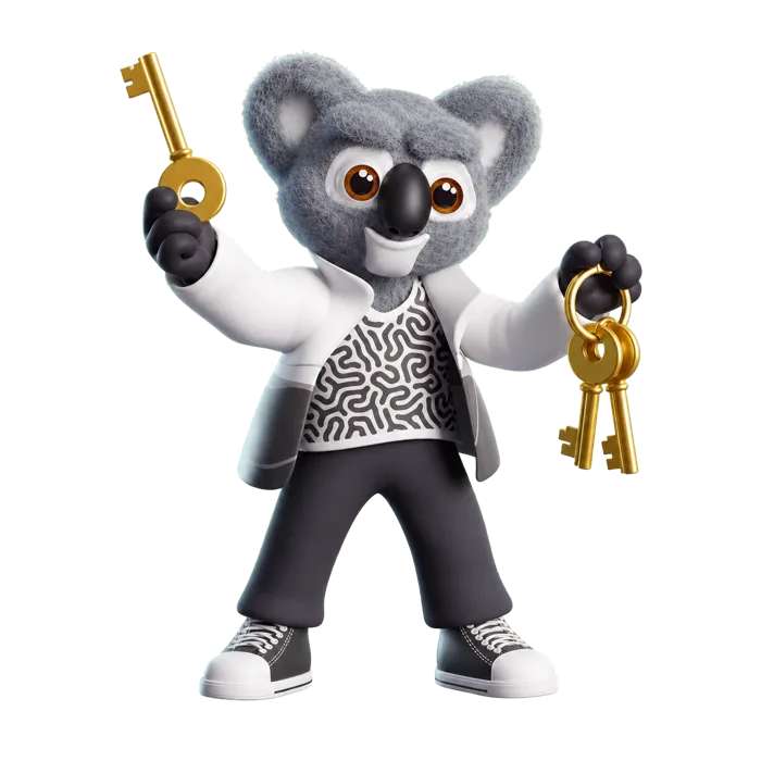 Kody holding a golden key with both paws